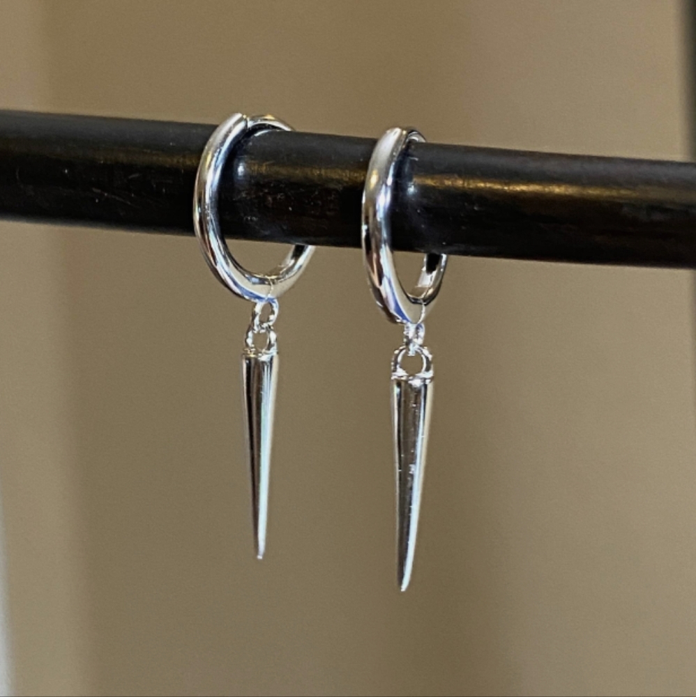 Dangling spike earrings